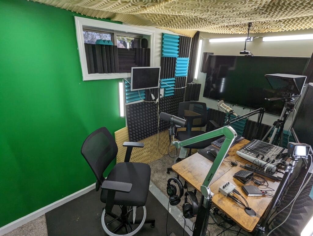The Chivalrous Productions studio with green screen, monitors and acoustic treatment